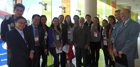 Distinguished Lecturer Jim Newman (center) poses with chapter members.